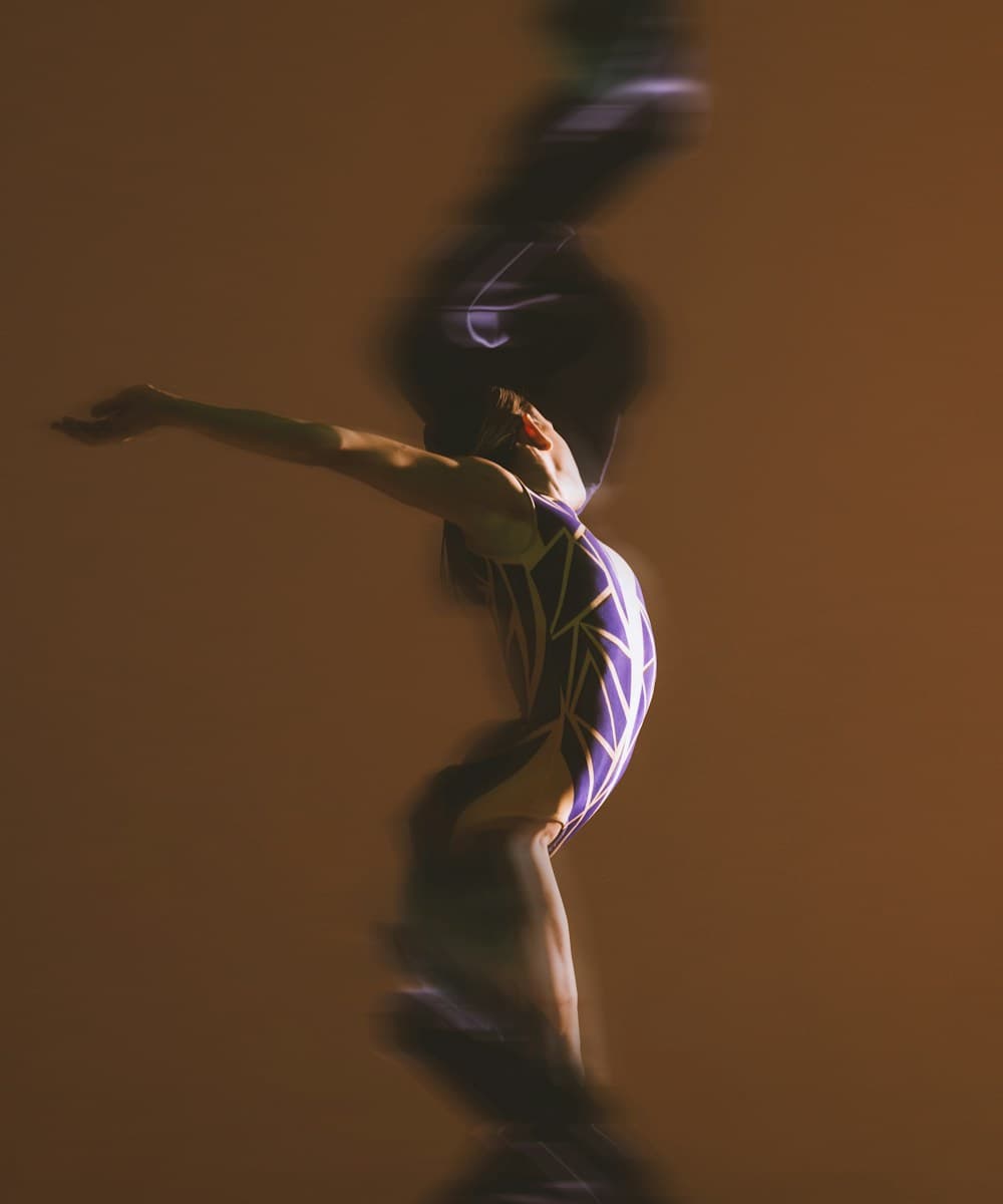 A gymnast mid-routine